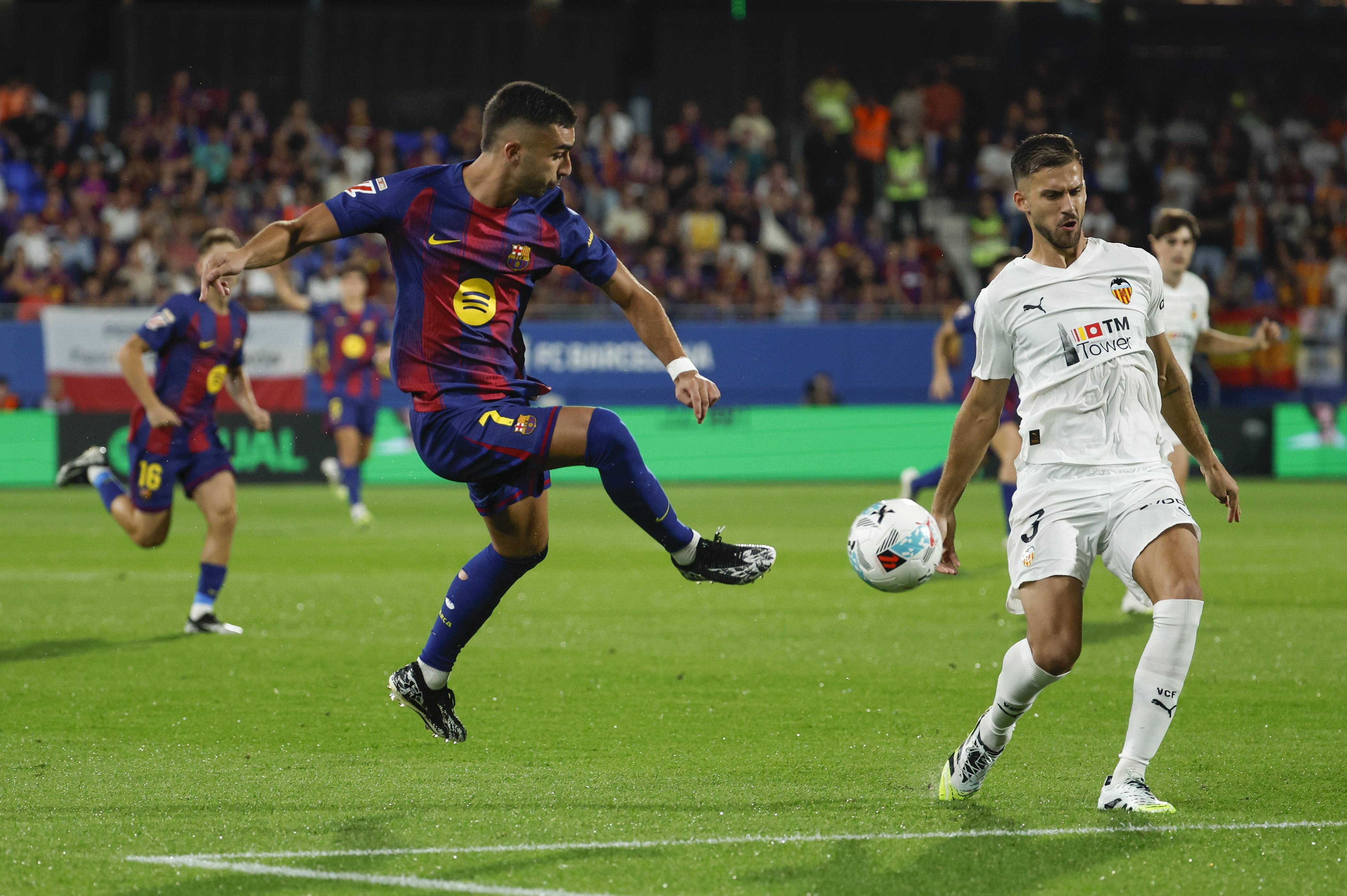 梅西攻入制胜球,巴萨客场战胜瓦伦西亚 梅西攻入制胜球,巴萨客场战胜瓦伦西亚